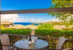 The raised table for four that showcases the incredible ocean and island views.